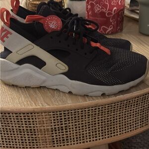 Nike Black and White Athletic Shoes with Red Highlights